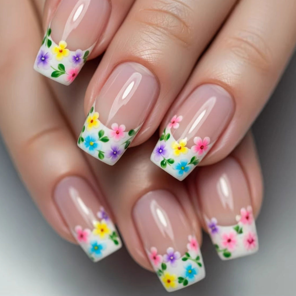 Artificial nails with floral applications 
Maetiva
