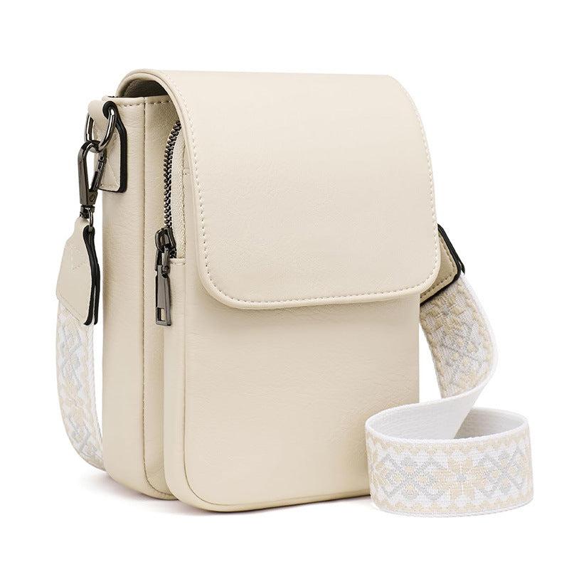 Small crossbody bag with decorative shoulder strap 
Maetiva