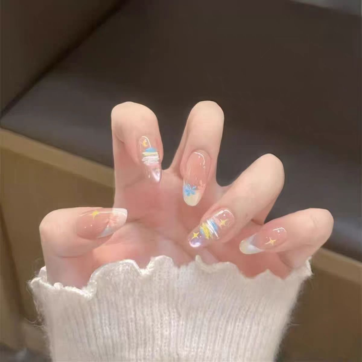Ombre Stiletto Press-On Nail Art with Gem Accents 
Maetiva