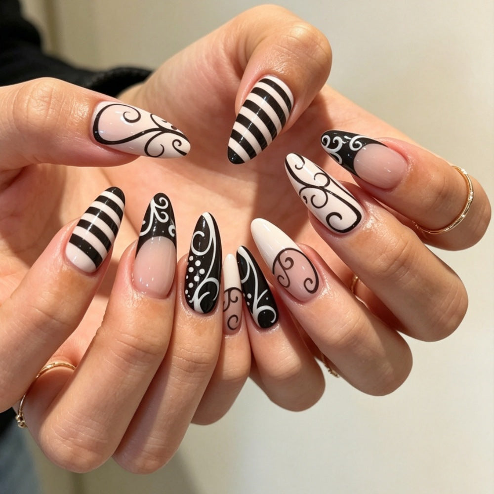 Artificial nails with modern night motif 
Maetiva