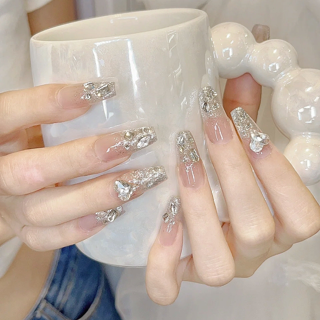 Ombre Stiletto Press-On Nail Art with Gem Accents 
Maetiva