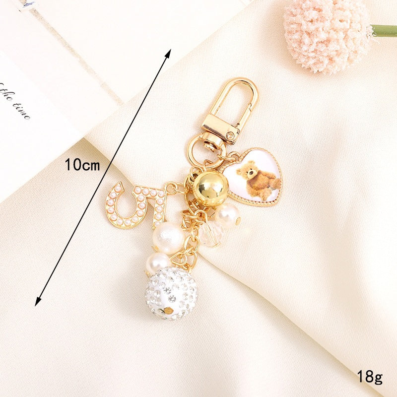 Playful keychain with teddy bear motif 
Maetiva