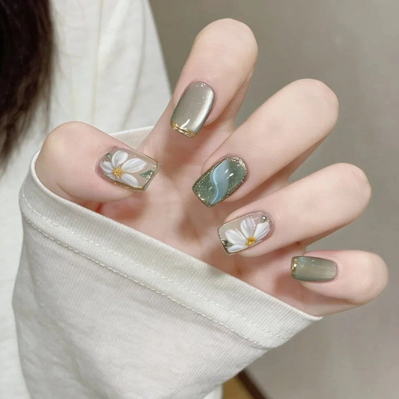 Ombre Stiletto Press-On Nail Art with Gem Accents 
Maetiva