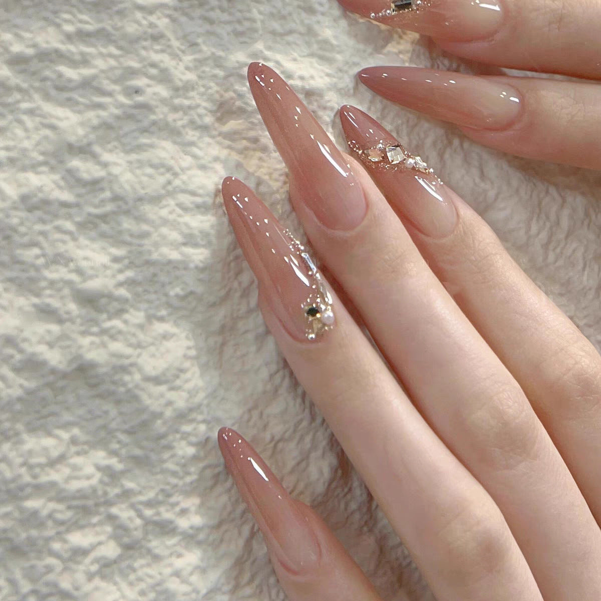 Ombre Stiletto Press-On Nail Art with Gem Accents 
Maetiva