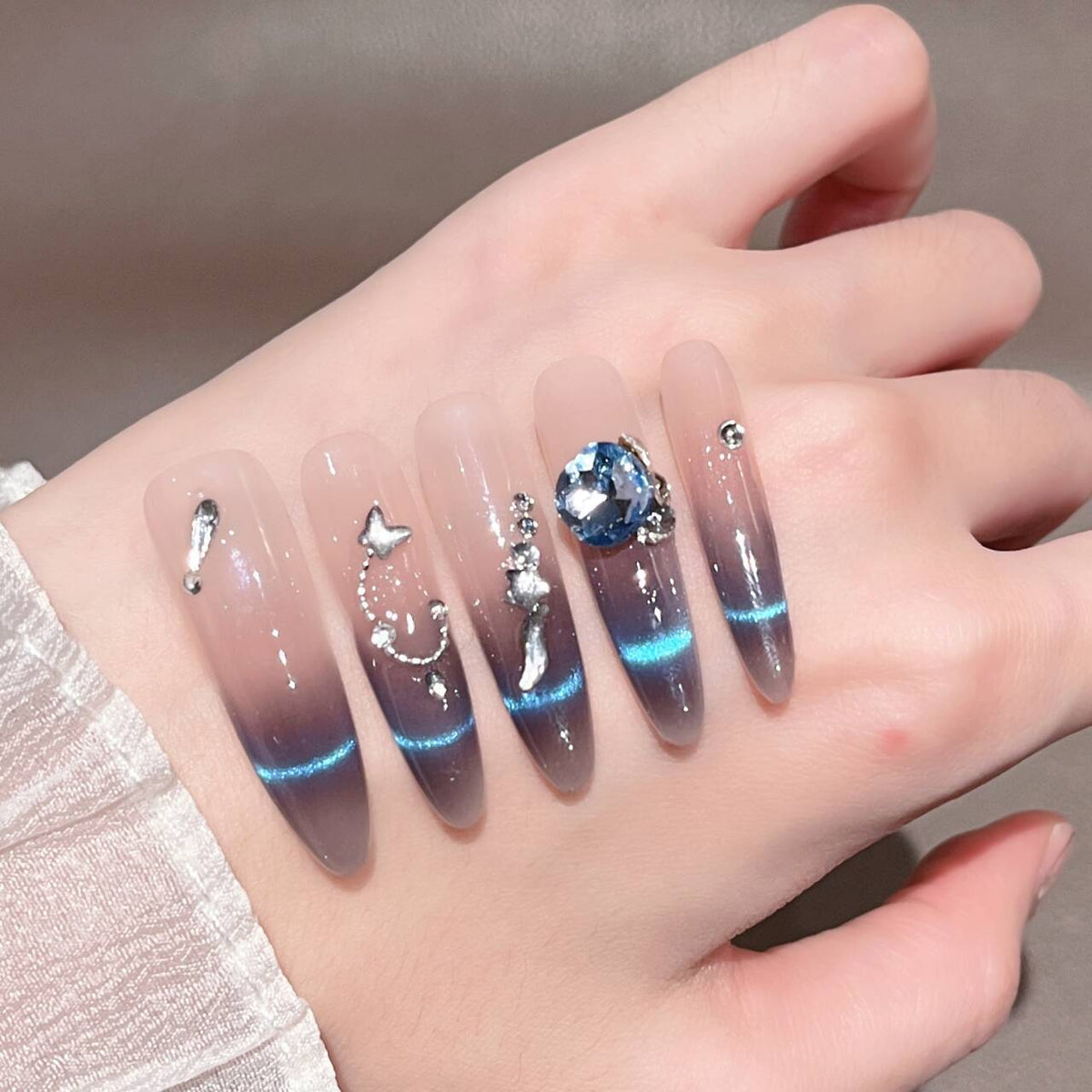 Glamorous Crystal-Studded Stiletto Press-On Nails 
Maetiva