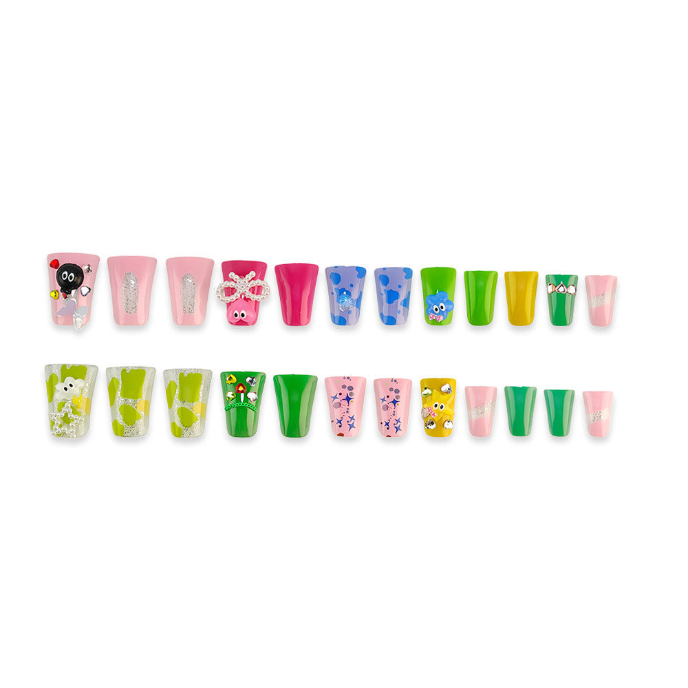 Creative press-on nails with playful 3D designs 
Maetiva
