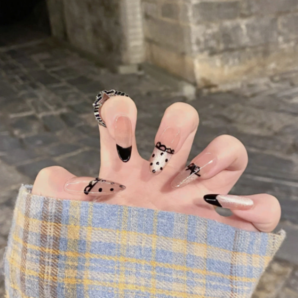 Ombre Stiletto Press-On Nail Art with Gem Accents 
Maetiva