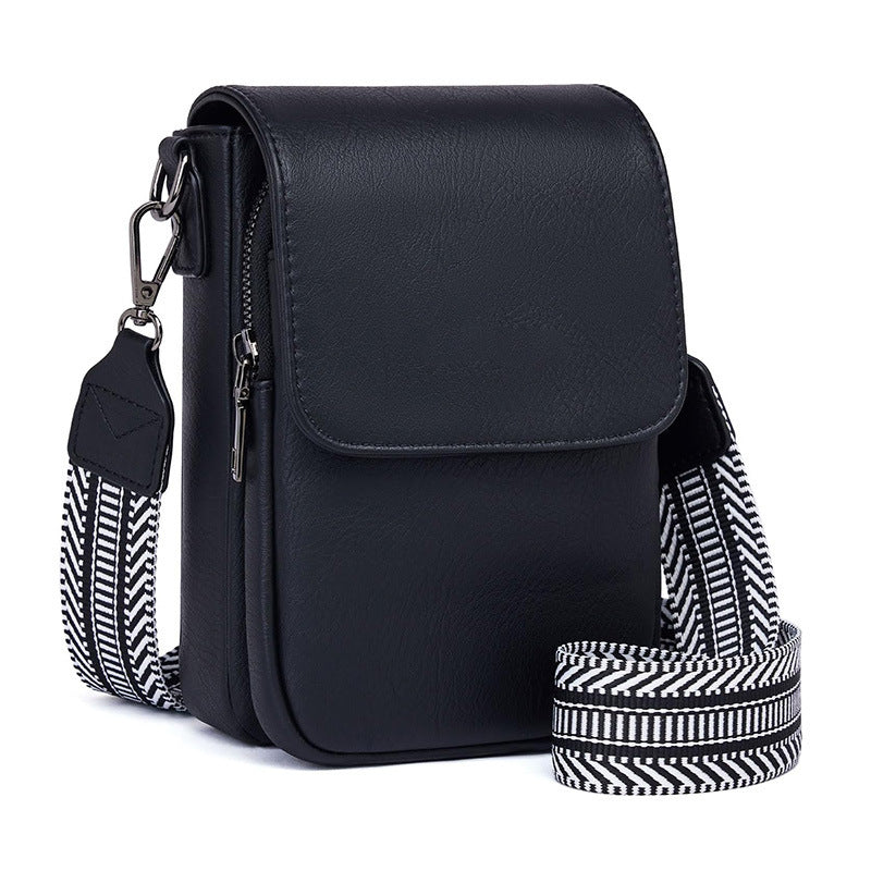 Small crossbody bag with decorative shoulder strap 
Maetiva