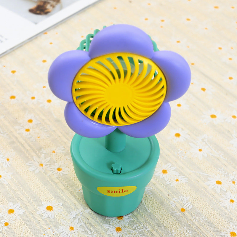 Ladies Portable Hand Fan with Playful Design 
Maetiva