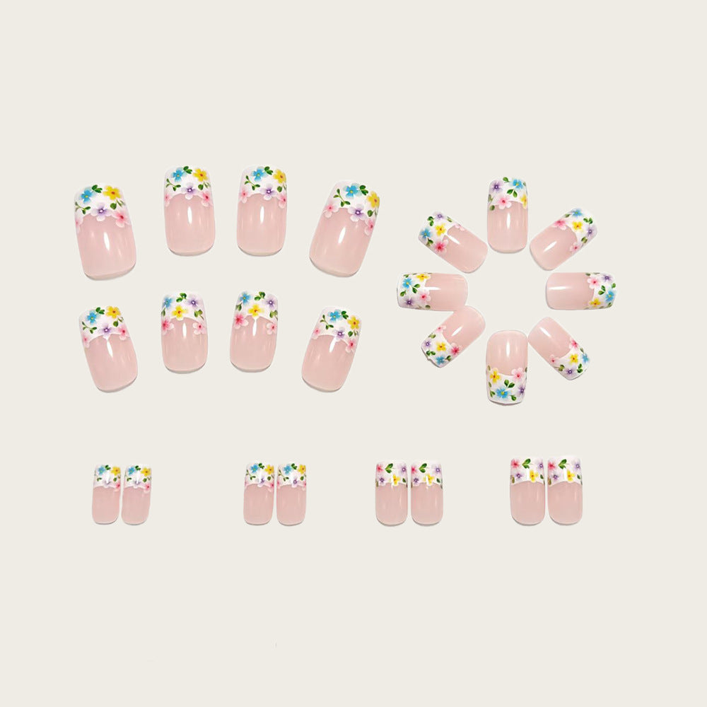 Artificial nails with floral applications 
Maetiva