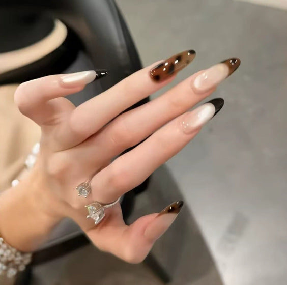 Ombre Stiletto Press-On Nail Art with Gem Accents 
Maetiva