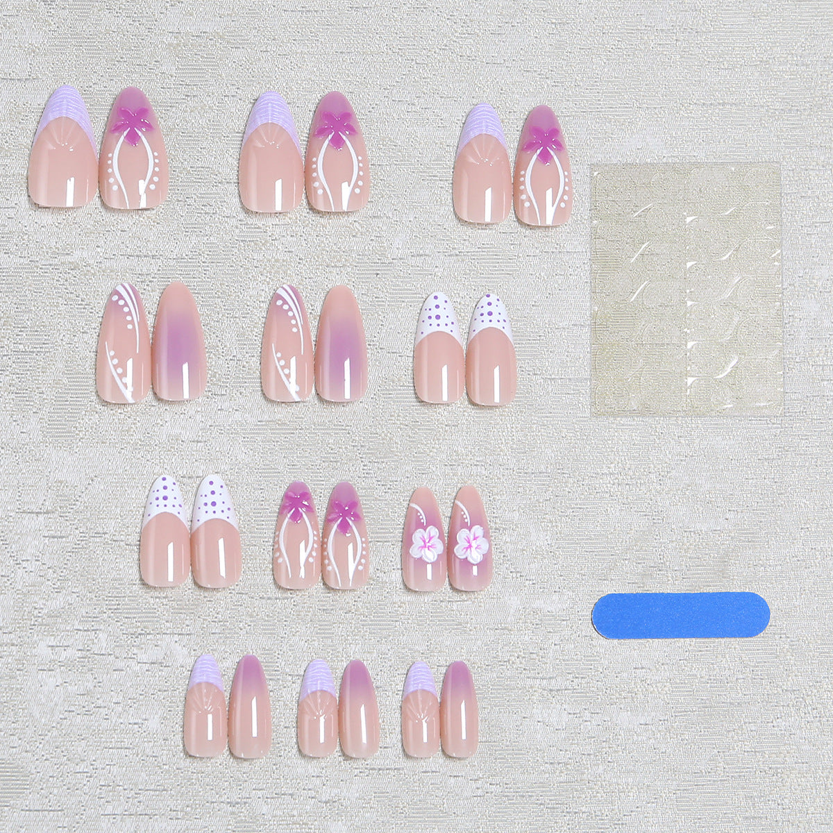 Artifical nails with delicate floral and geometric patterns 
Maetiva