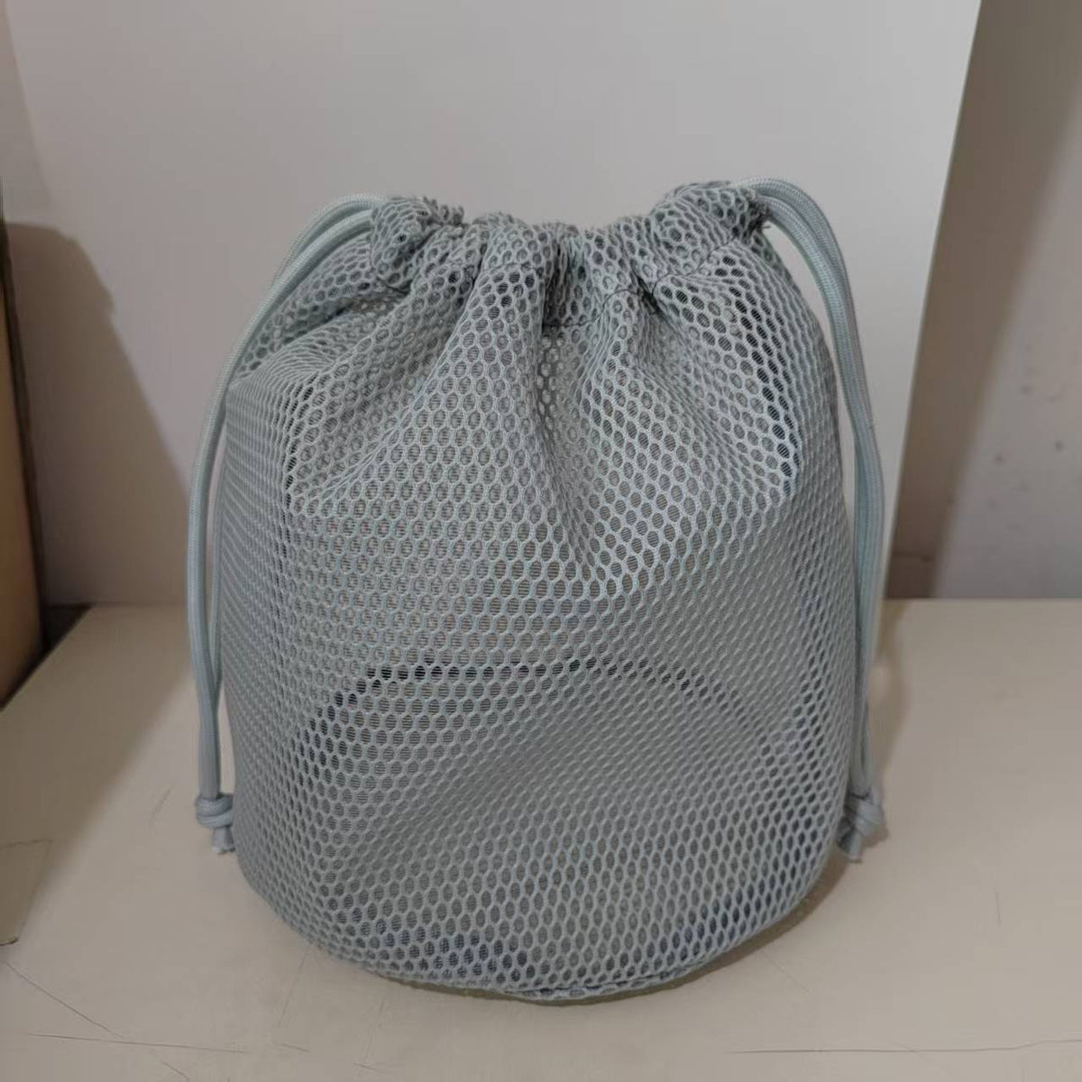 Light mesh bag from 
Maetiva
