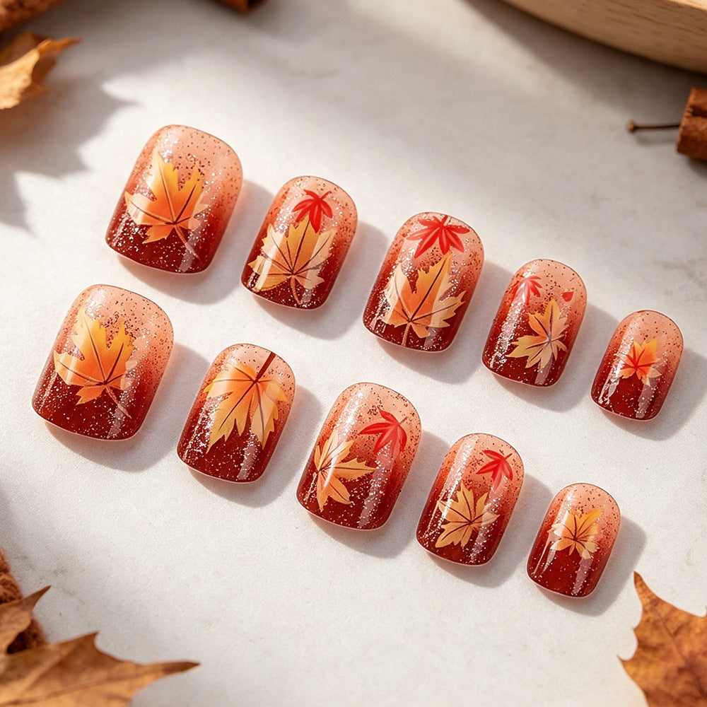 Autumn-Themed Gel Nail Art 
Maetiva