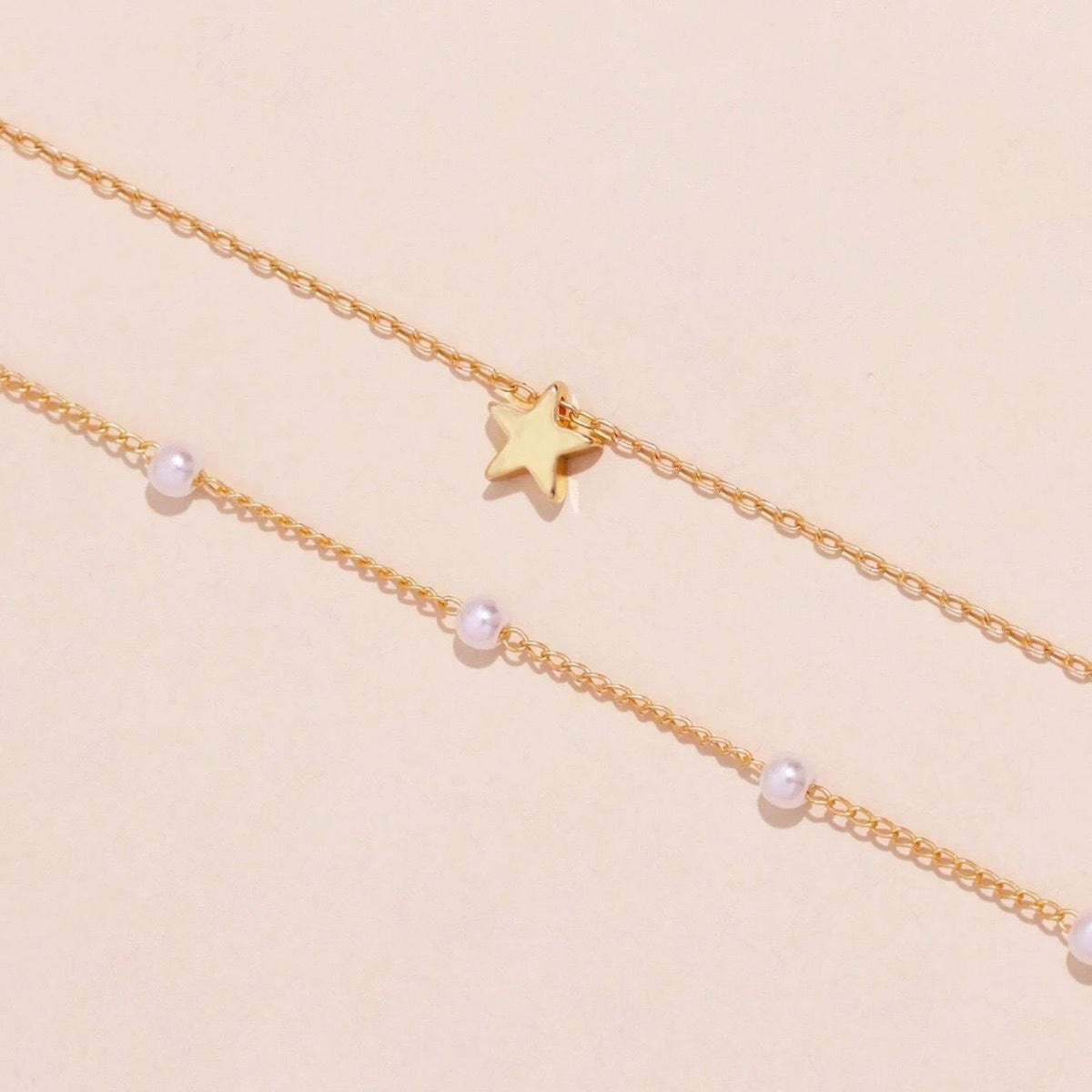 Layered Pearl and Star Pendant Necklace 
Maetiva