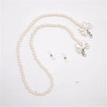 Elegant pearl glasses chain with bow pendants 
Maetiva