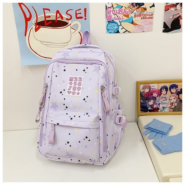 Playful backpack with star motifs and practical functions 
Maetiva