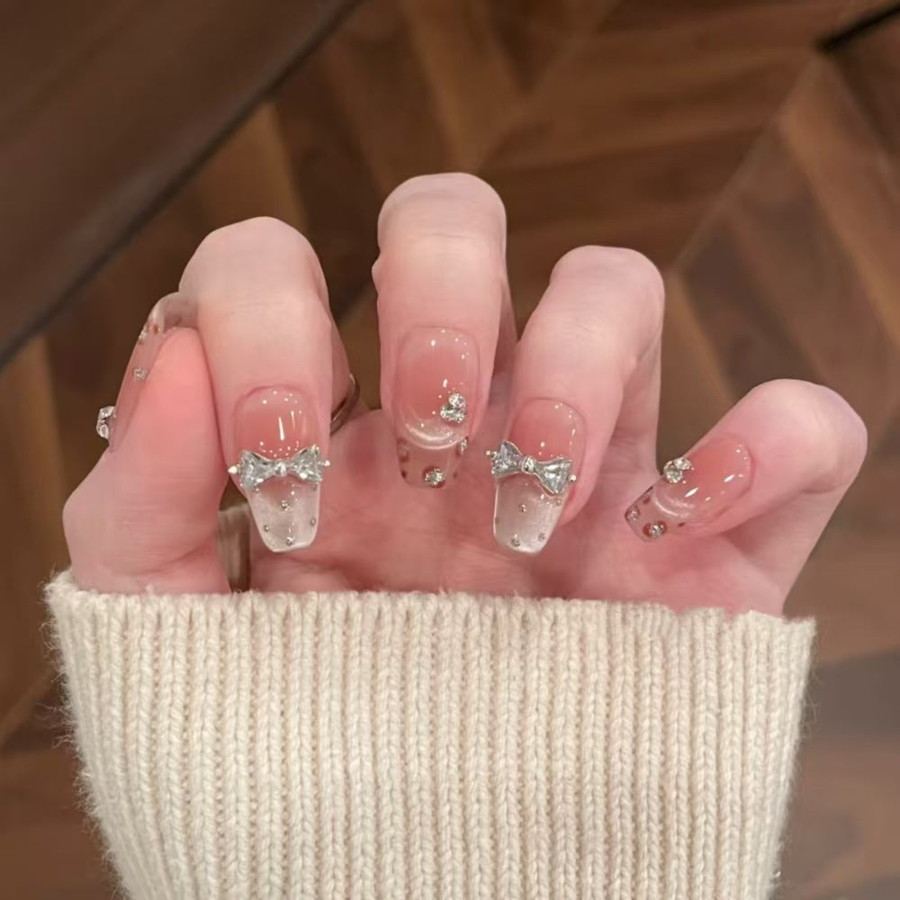 Ombre Stiletto Press-On Nail Art with Gem Accents 
Maetiva