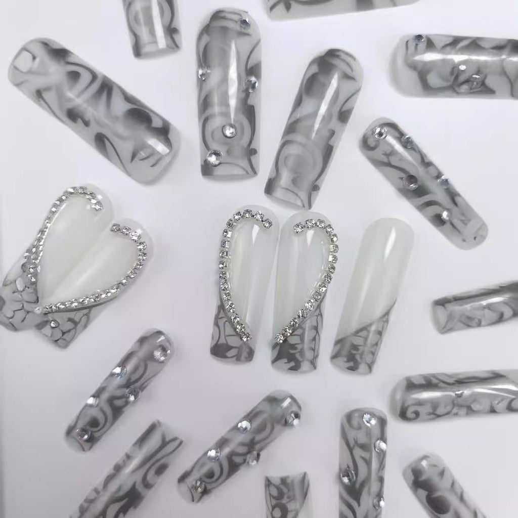Artificial nails with modern night motif 
Maetiva
