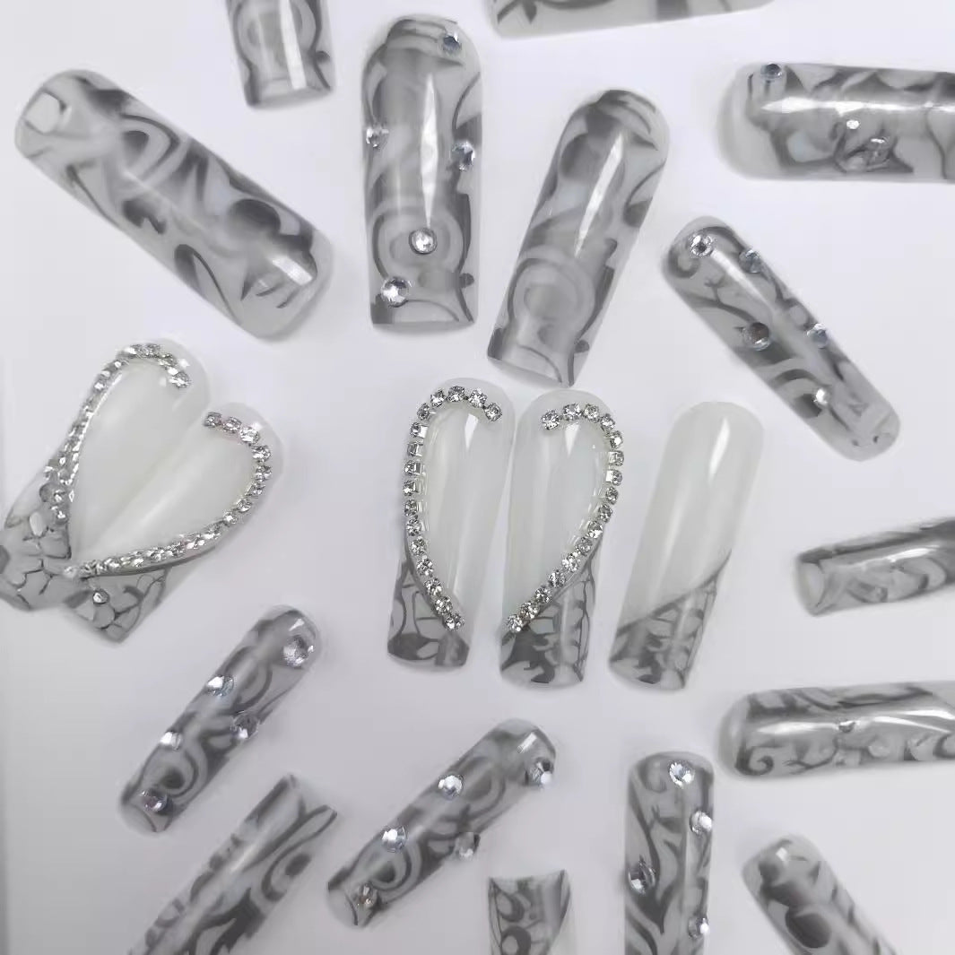 Artificial nails with modern night motif 
Maetiva