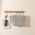 Elegant Woven Basket Bag with Sturdy Handles 
Maetiva