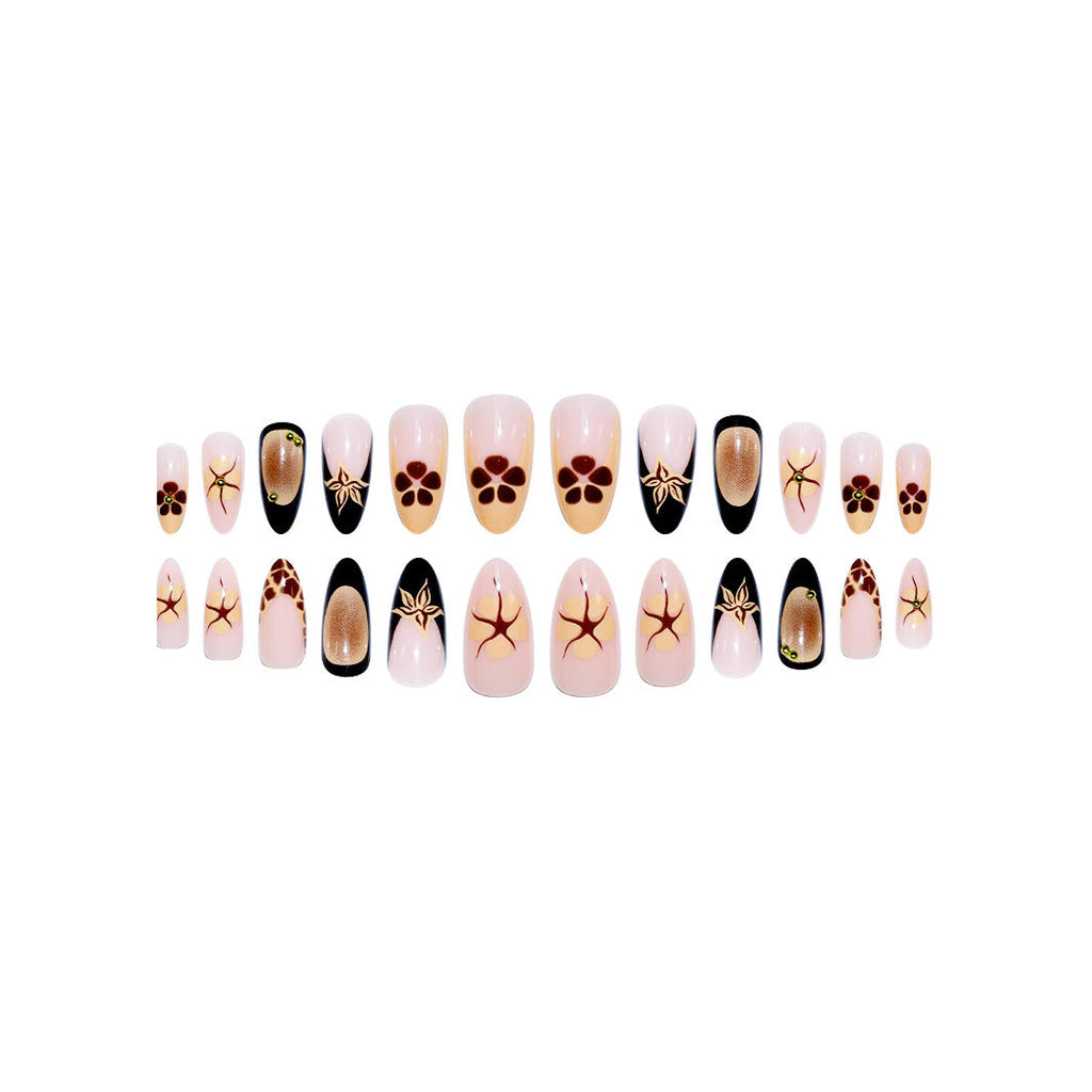 Elegant Artistic Almond-Shaped Nail Extensions 
Maetiva