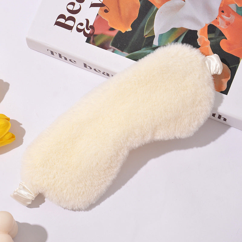 Women's fluffy ergonomic eye mask with adjustable satin band and soft faux fur cover 
Maetiva