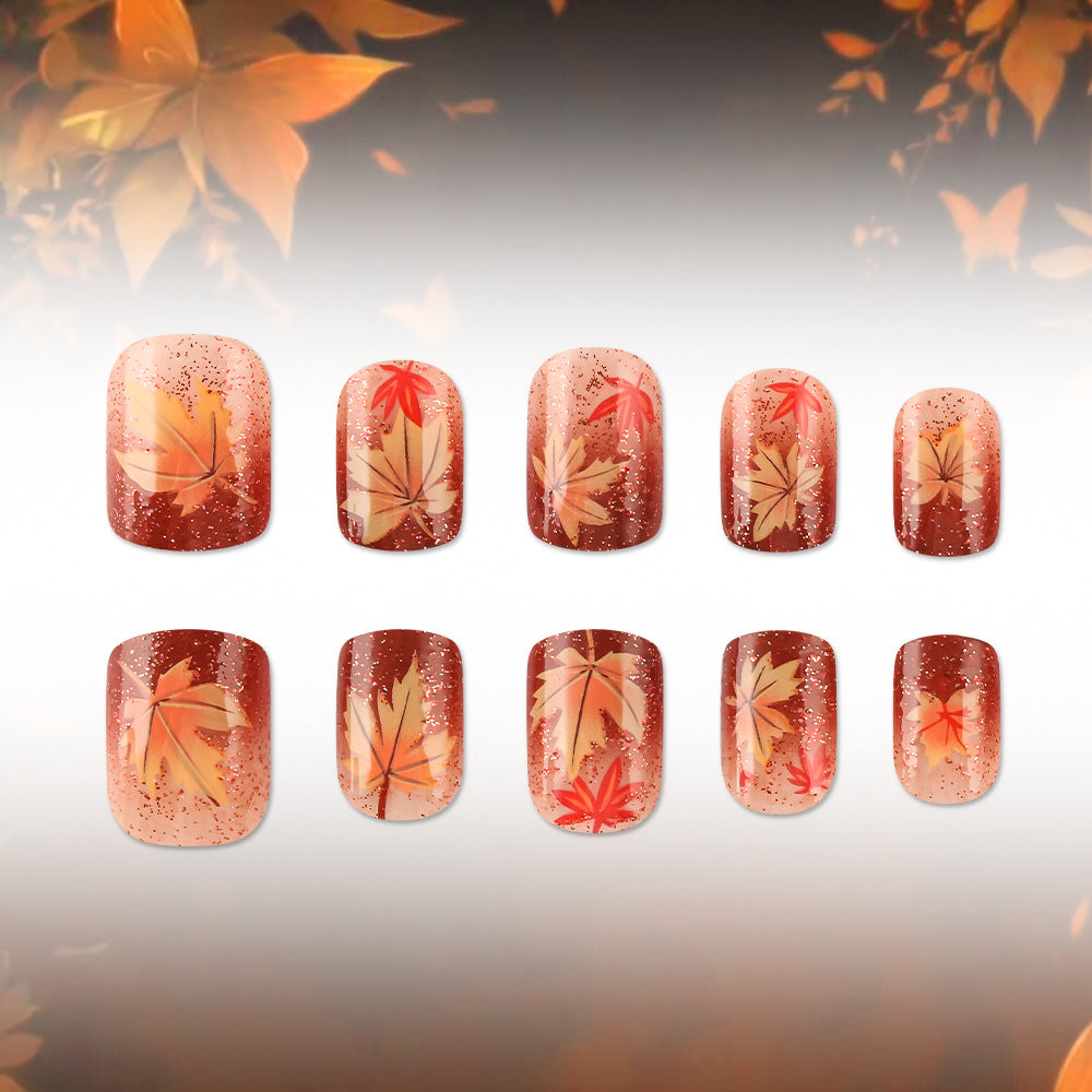 Autumn-Themed Gel Nail Art 
Maetiva