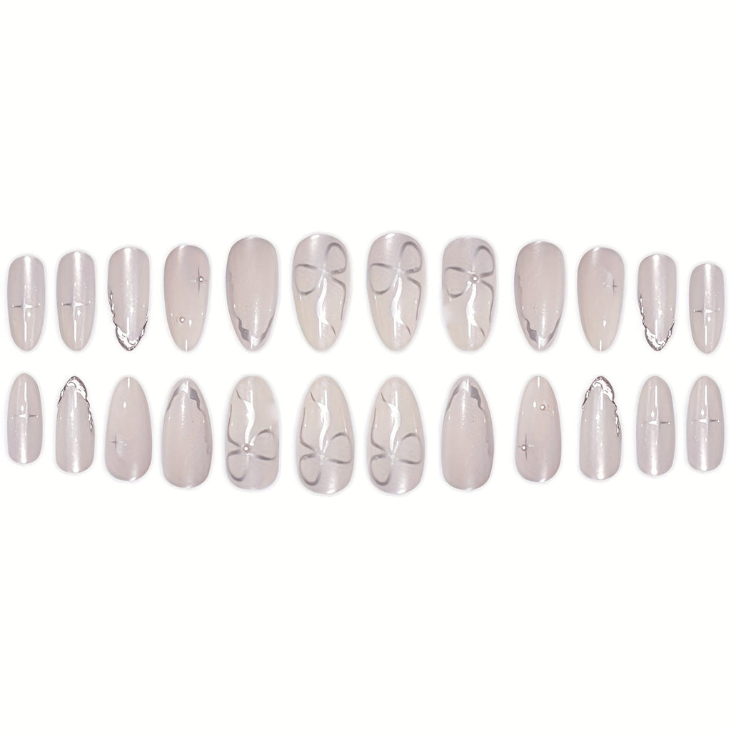 Elegant Press-On Nail Art with Floral Accents 
Maetiva