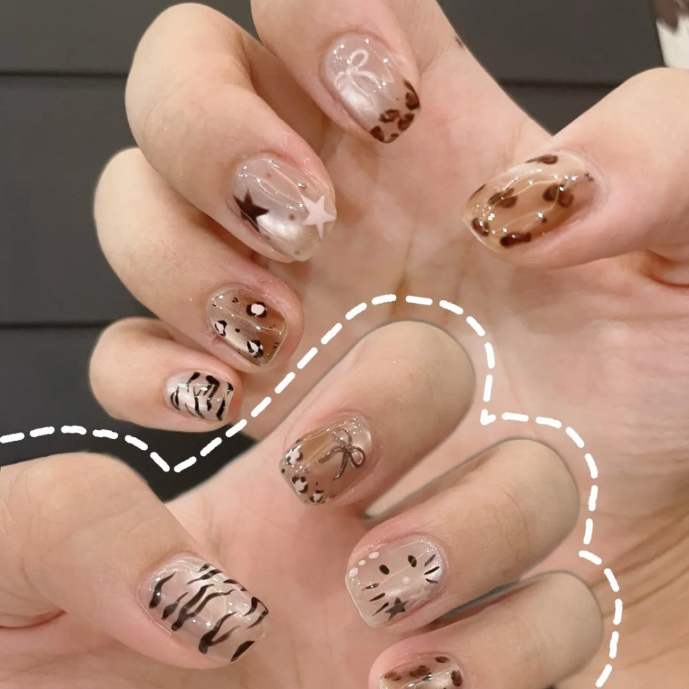 Ombre Stiletto Press-On Nail Art with Gem Accents 
Maetiva