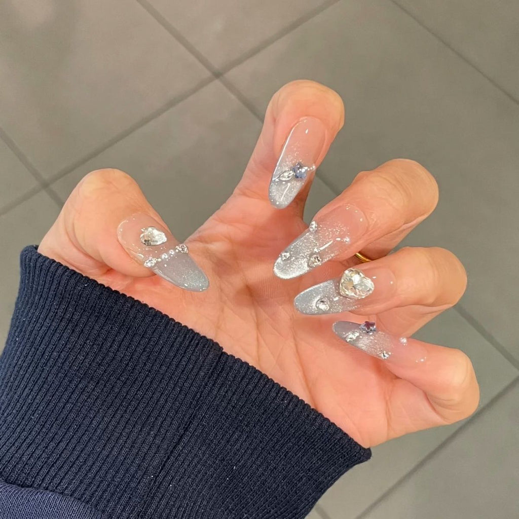 Ombre Stiletto Press-On Nail Art with Gem Accents 
Maetiva