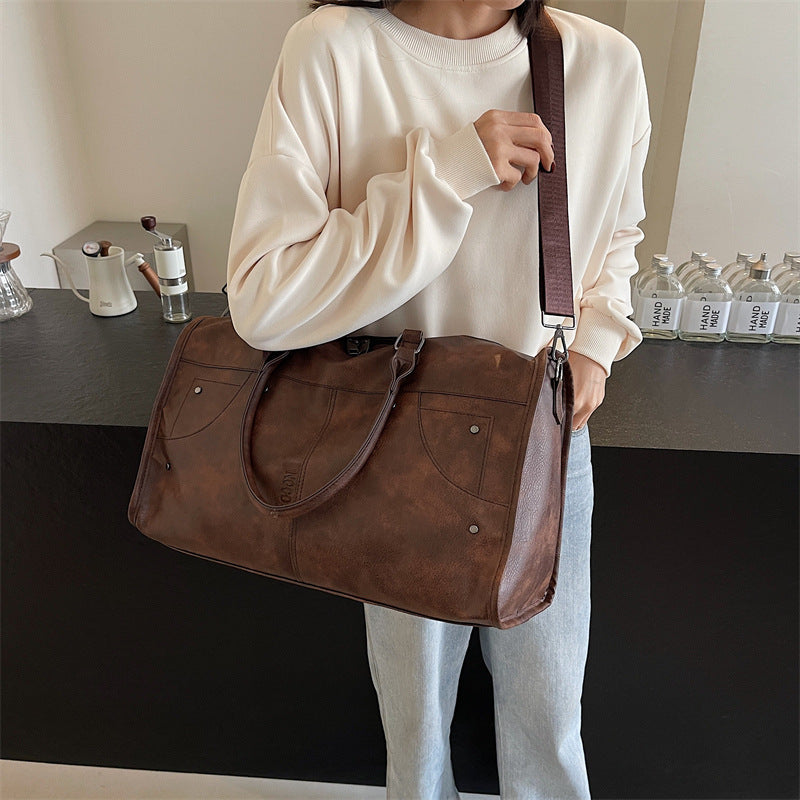 Elegant and Spacious Travel Bag Made of Durable Faux Leather 
Maetiva