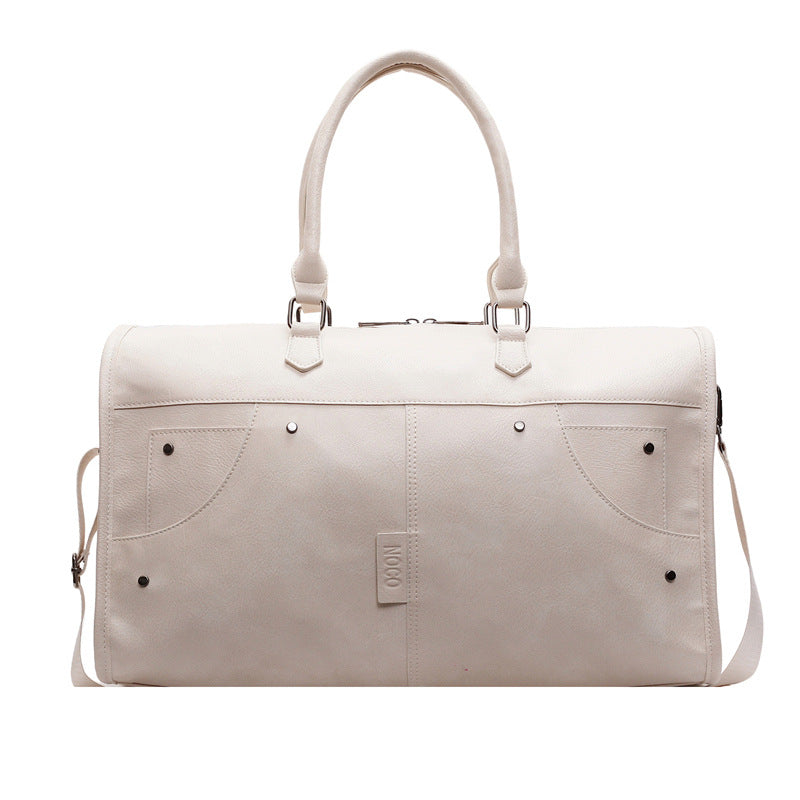 Elegant and Spacious Travel Bag Made of Durable Faux Leather 
Maetiva