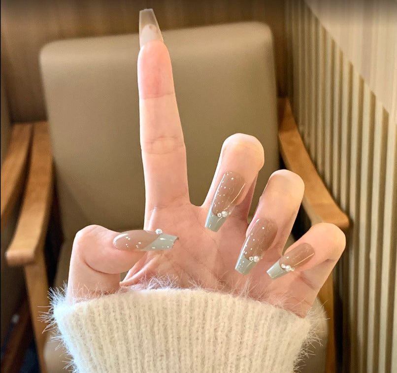 Ombre Stiletto Press-On Nail Art with Gem Accents 
Maetiva