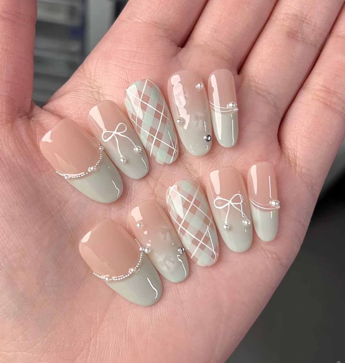 Ombre Stiletto Press-On Nail Art with Gem Accents 
Maetiva