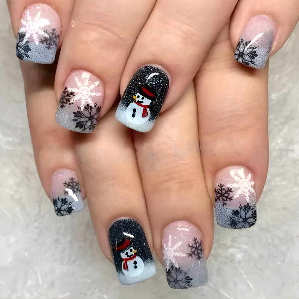 Holiday-Themed Press-On Nails 
Maetiva