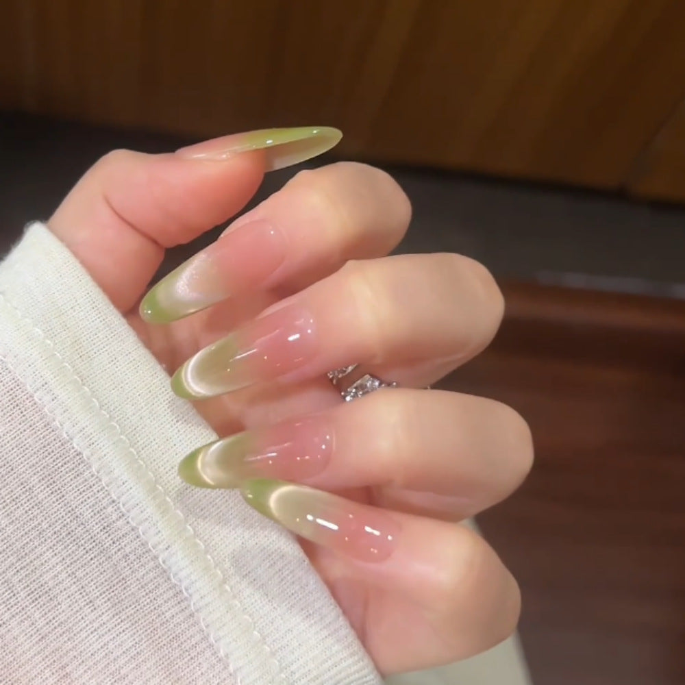 Ombre Stiletto Press-On Nail Art with Gem Accents 
Maetiva