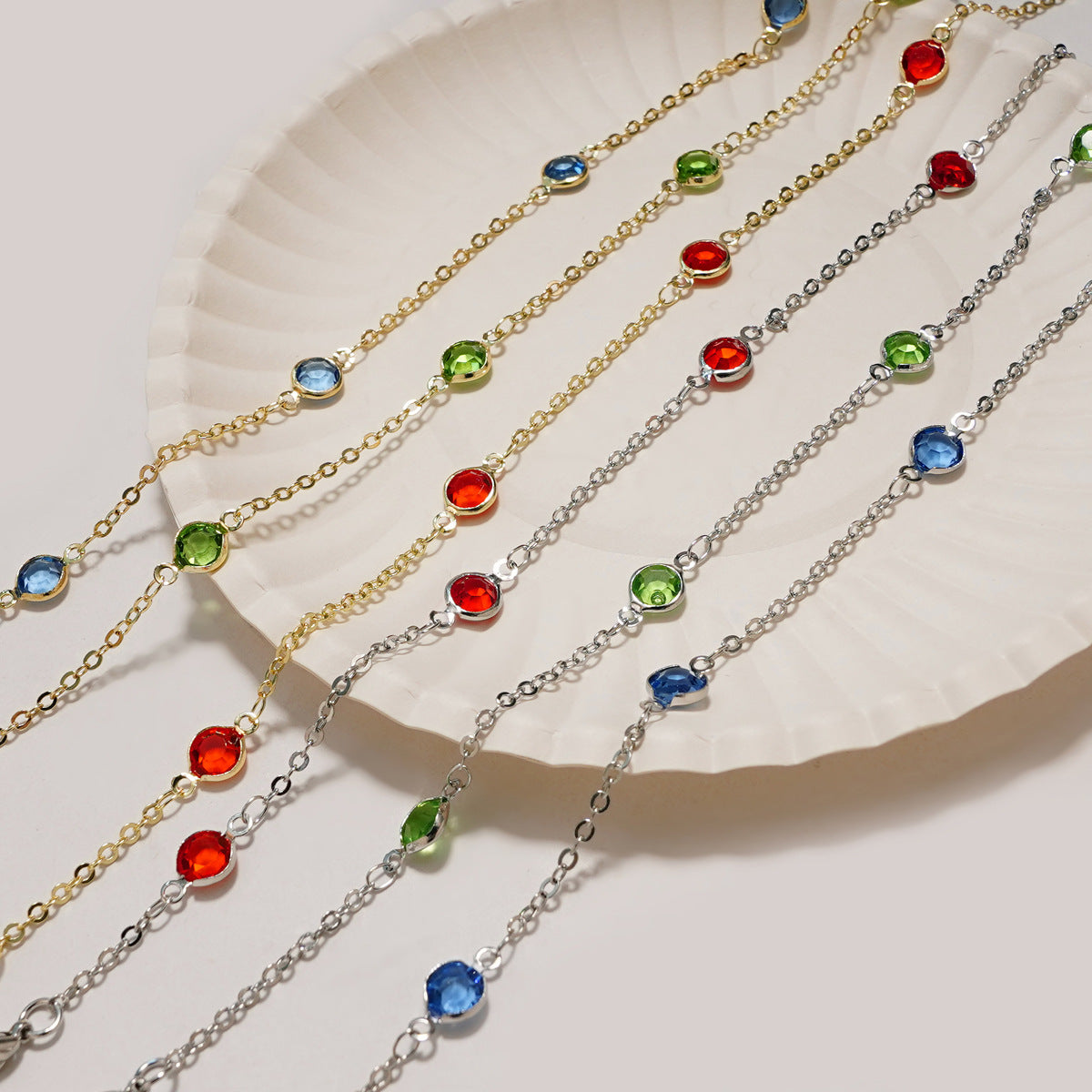 Gemstone-Studded Eyewear Holder 
Maetiva