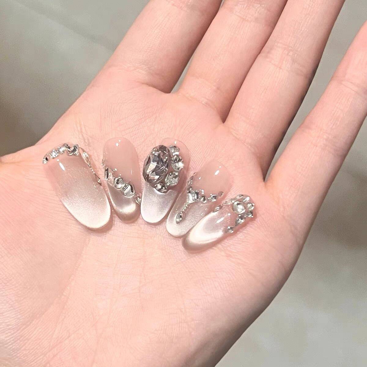 Glamorous Crystal-Studded Stiletto Press-On Nails 
Maetiva