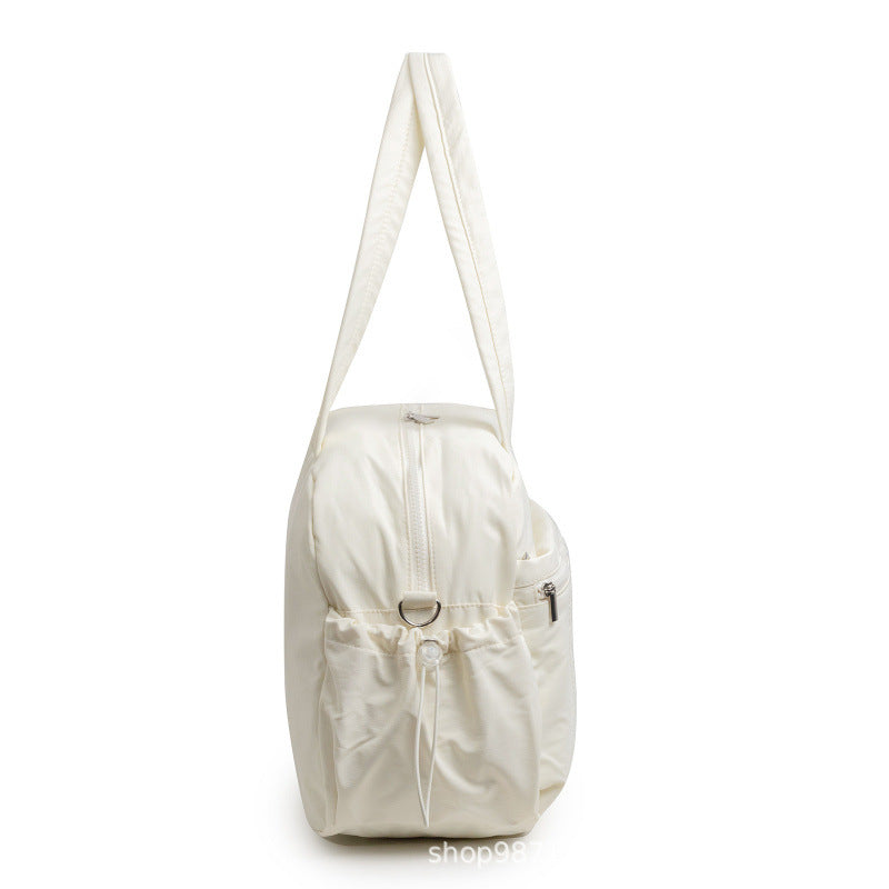 Elegant tote bag with multiple compartments 
Maetiva