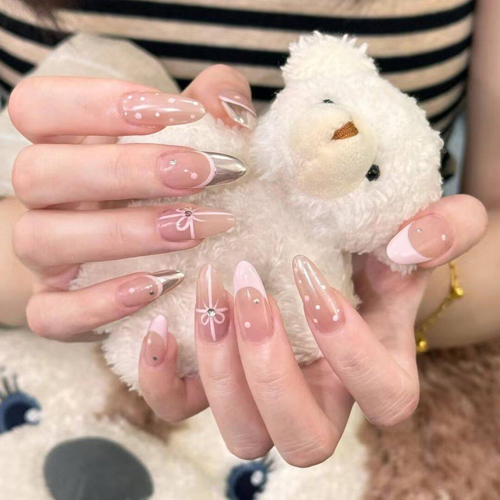 Artistic Nail Design with Decorative Elements 
Maetiva