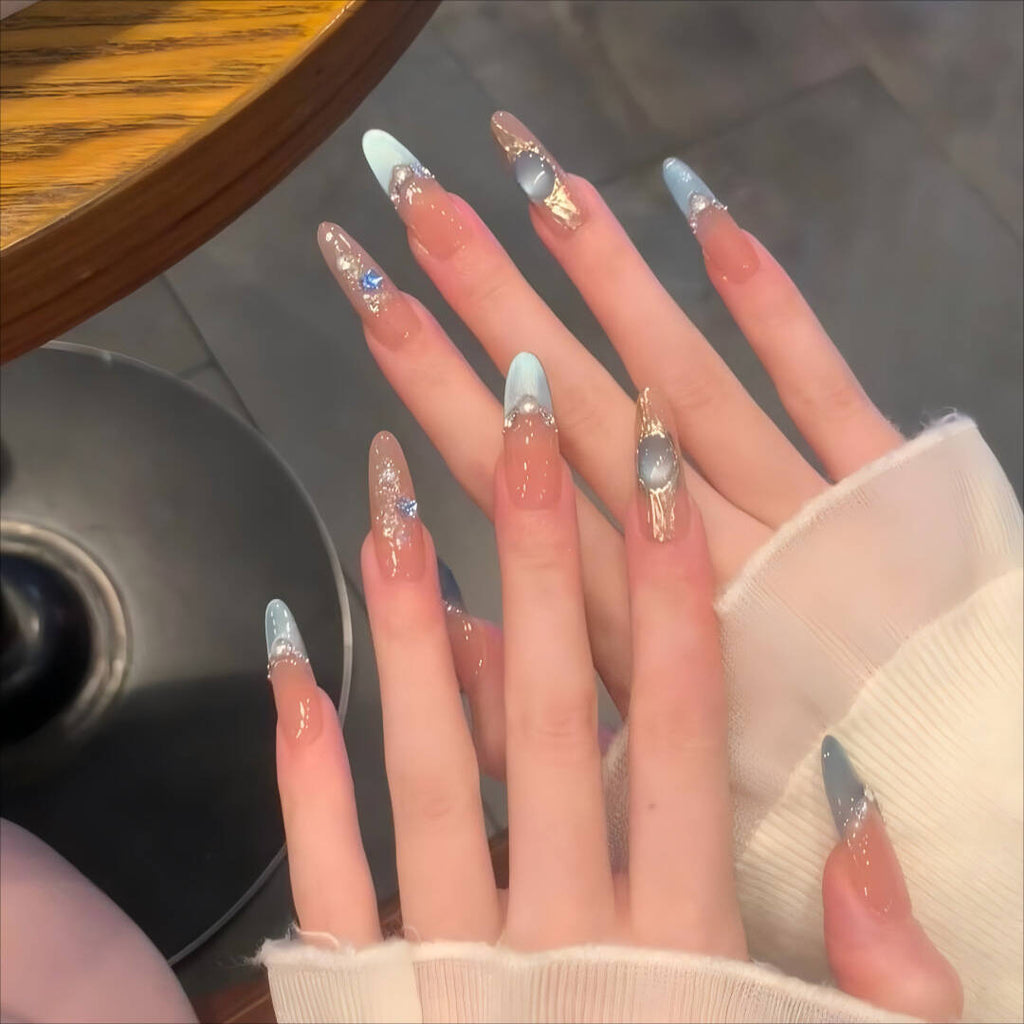 Artistic Nail Design with Decorative Elements 
Maetiva