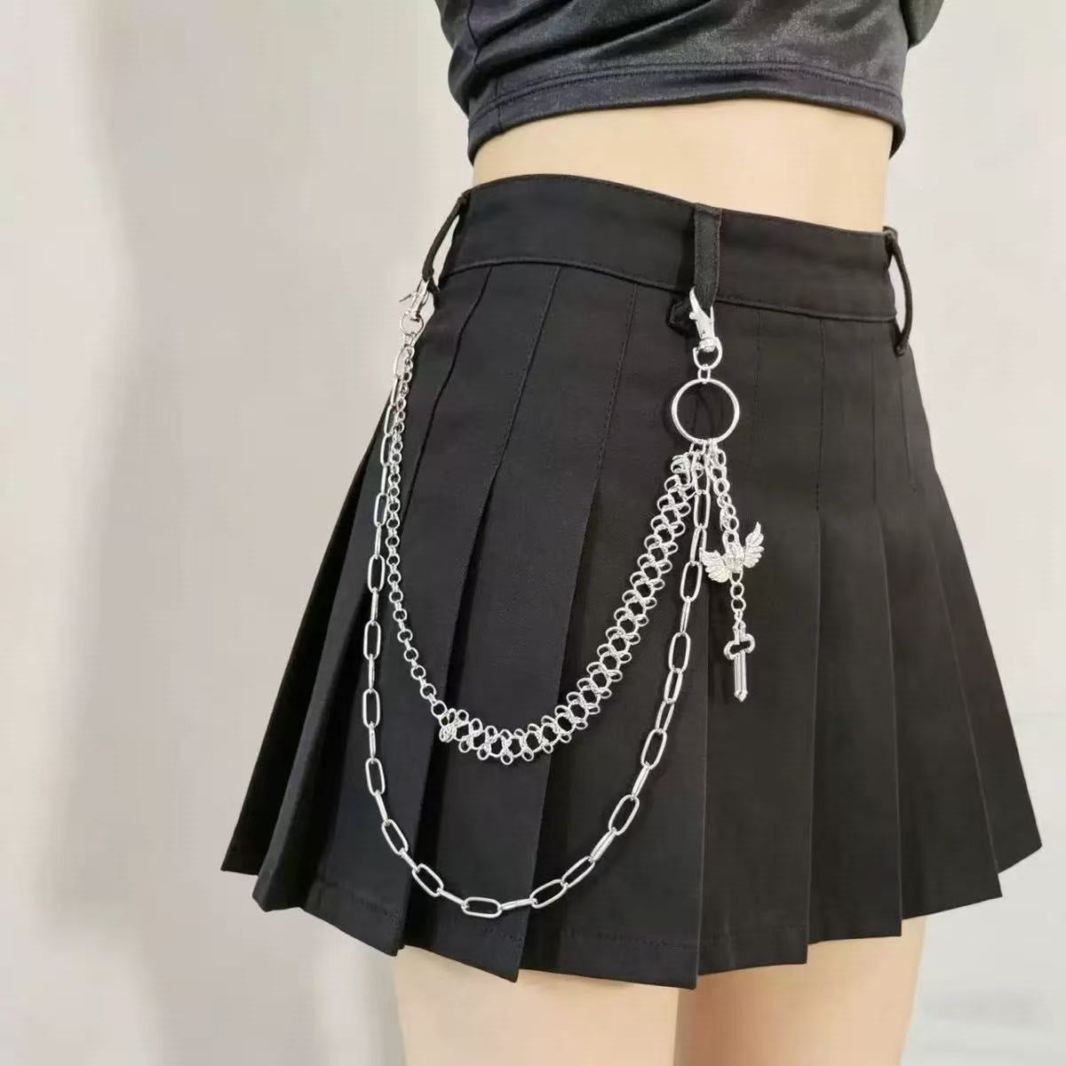 Pleated skirt with stylish chains by 
Maetiva