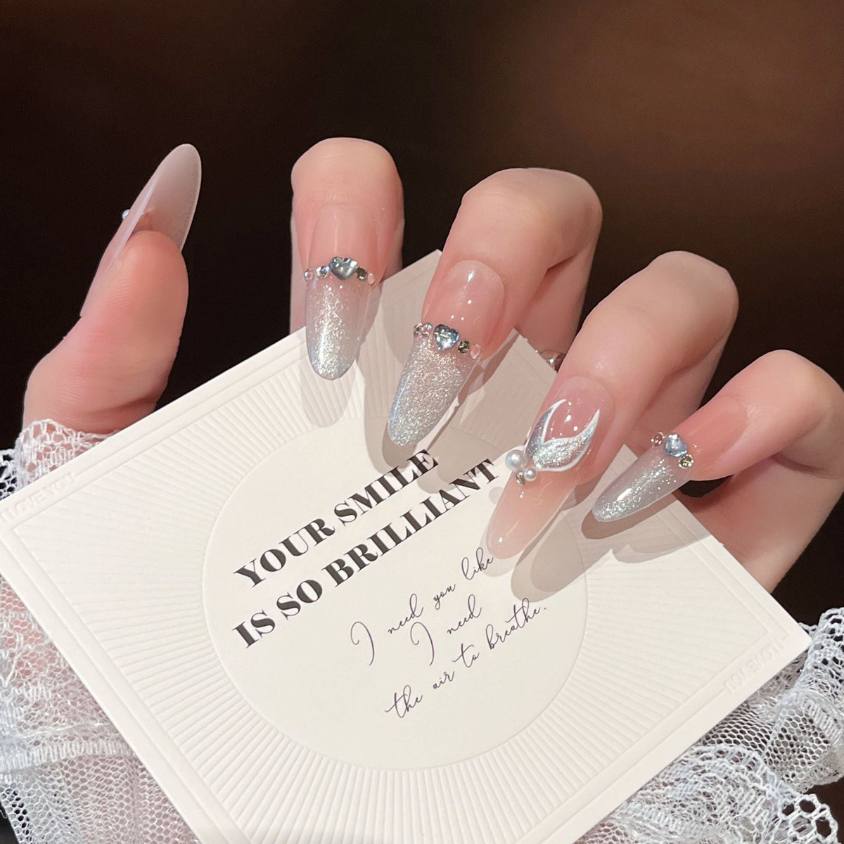 Glamorous Crystal-Studded Stiletto Press-On Nails 
Maetiva