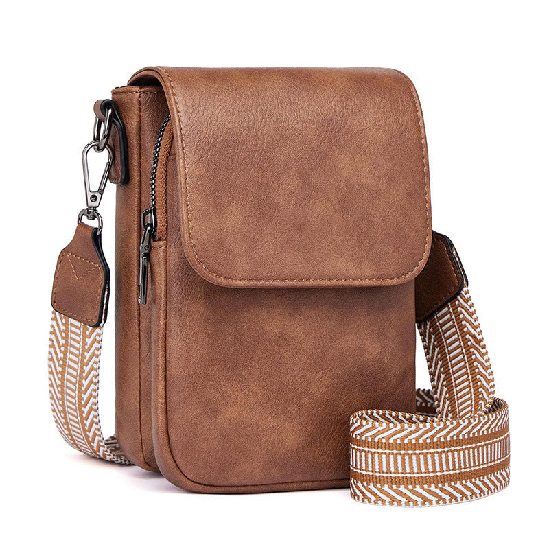 Small crossbody bag with decorative shoulder strap 
Maetiva