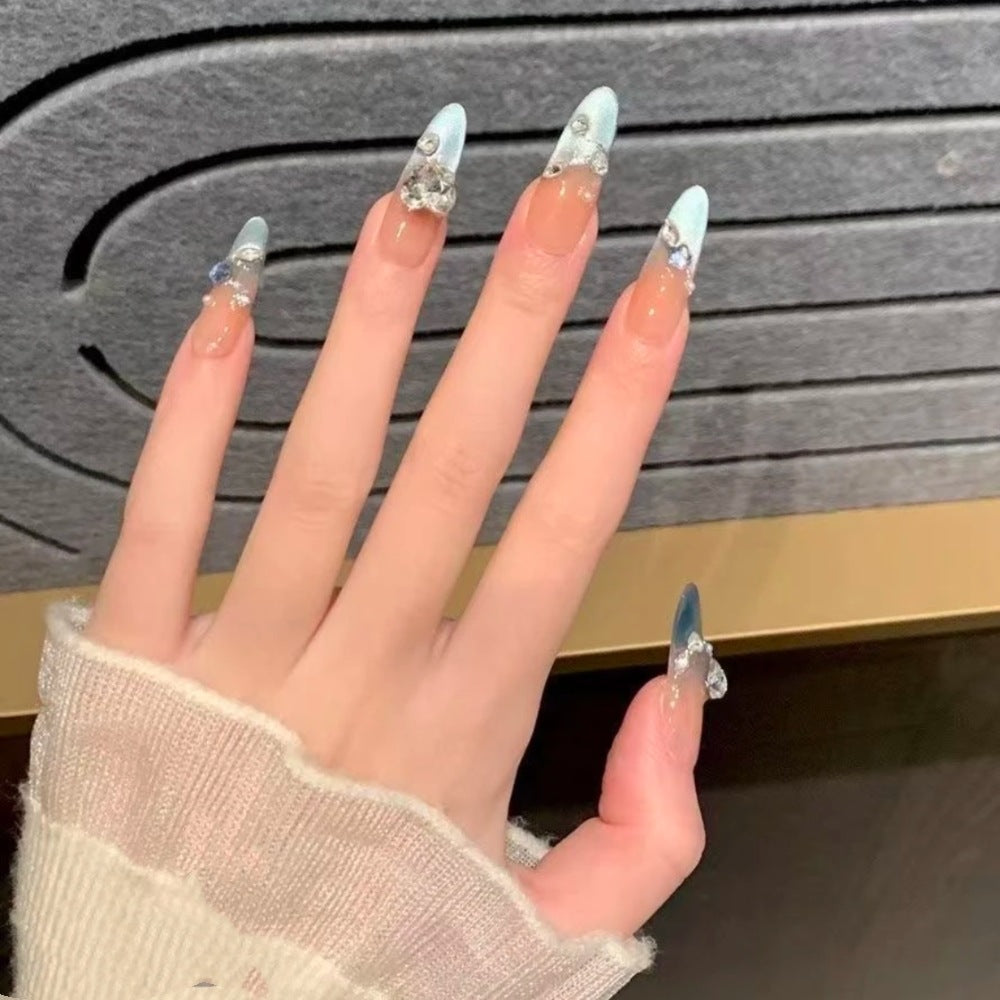 Ombre Stiletto Press-On Nail Art with Gem Accents 
Maetiva