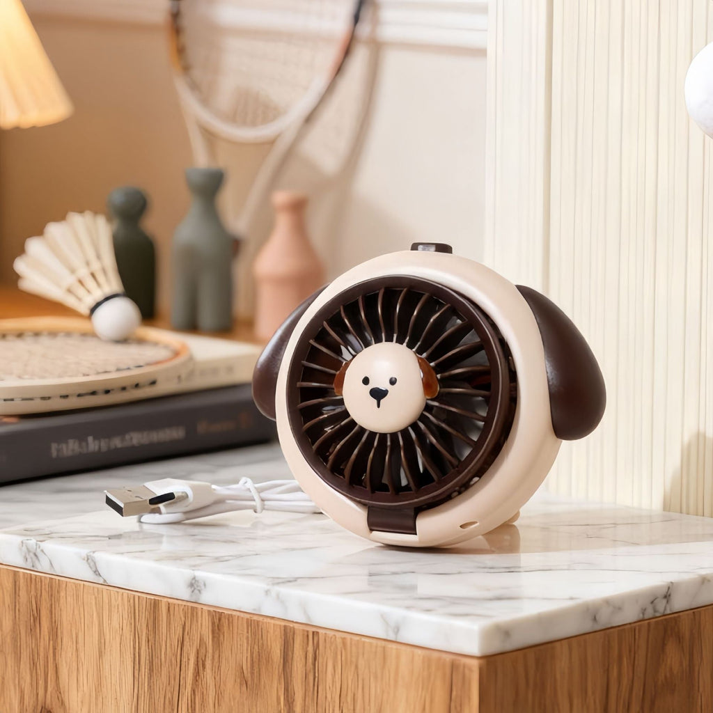 Portable handheld fan with cute dog design 
Maetiva