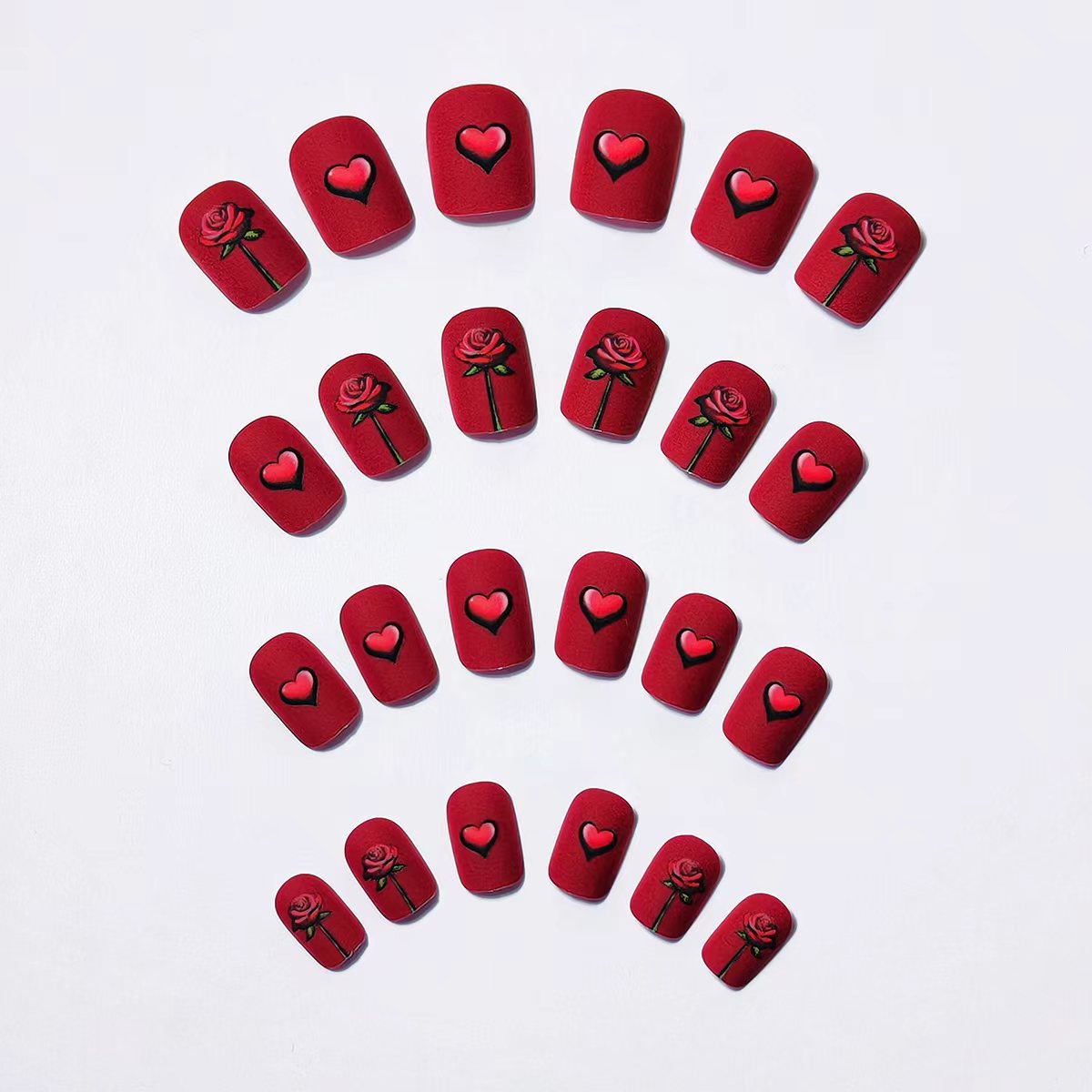 Artificial nails with romantic rose and heart design 
Maetiva