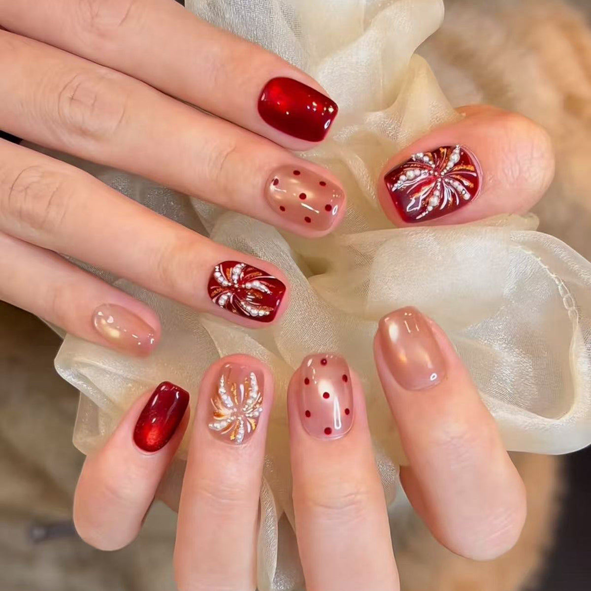 Artistic Nail Design with Decorative Elements 
Maetiva