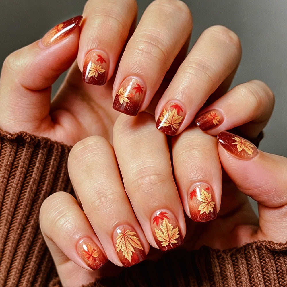 Autumn-Themed Gel Nail Art 
Maetiva